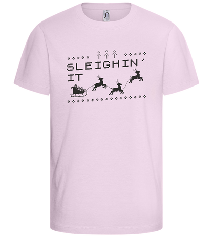 Sleighin' It Design - Basic kids t-shirt_LIGHT PINK_front