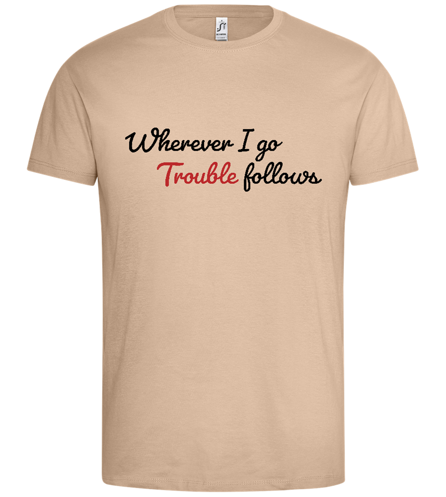 Trouble Follows Design - Premium men's t-shirt_SAND_front