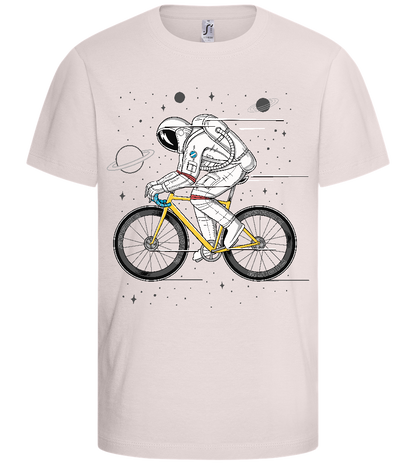 Astronaut on Bicycle Design - Basic kids t-shirt_LIGHT PINK_front