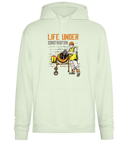 Life Under Construction Design - Premium Essential Unisex Hoodie_CREAMY GREEN_front