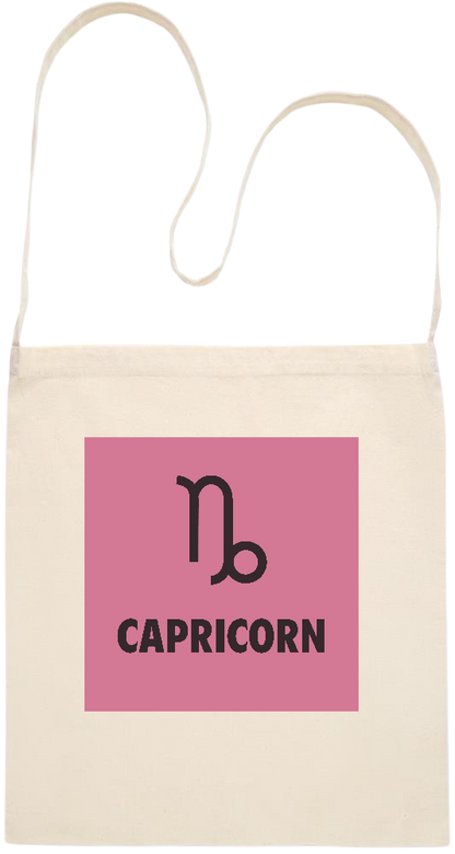 Zodiac Capricorn Design - Essential cross shoulder cotton tote bag_BEIGE_front