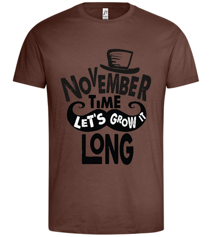 Growth in november Design - Premium men's t-shirt_CHOCOLATE_front