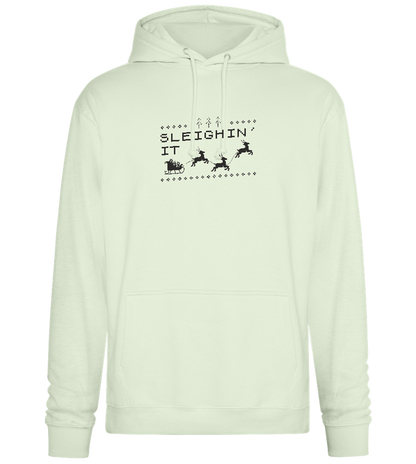 Sleighin' It Design - Premium Essential Unisex Hoodie_CREAMY GREEN_front