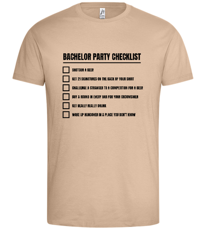 The Bachelor Party Checklist Design - Premium men's t-shirt_SAND_front