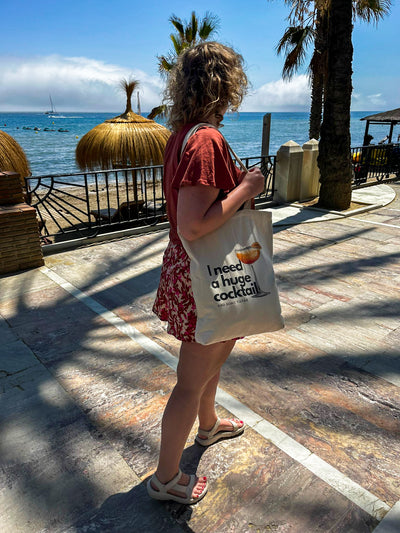 Happy client shows off their new favourite personalized beach bag made with ShirtUp!