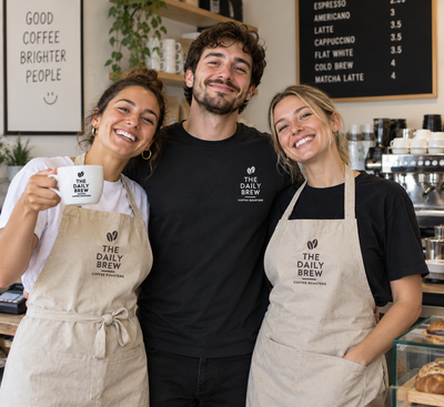 Team wearing personalized ShirtUp! aprons at a restaurant
