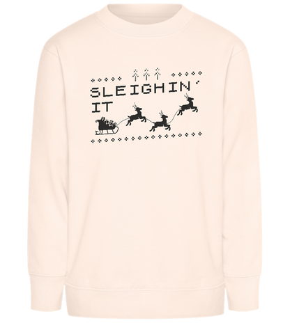 Sleighin' It Design - Comfort Kids Sweater_LIGHT PEACH ROSE_front