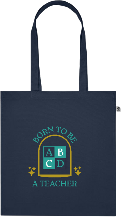 Born to be a Teacher Design - Premium colored organic cotton tote bag_FRENCH NAVY_front
