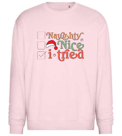 Naughty Nice Tried Design - Comfort Essential Unisex Sweater_LIGHT PEACH ROSE_front